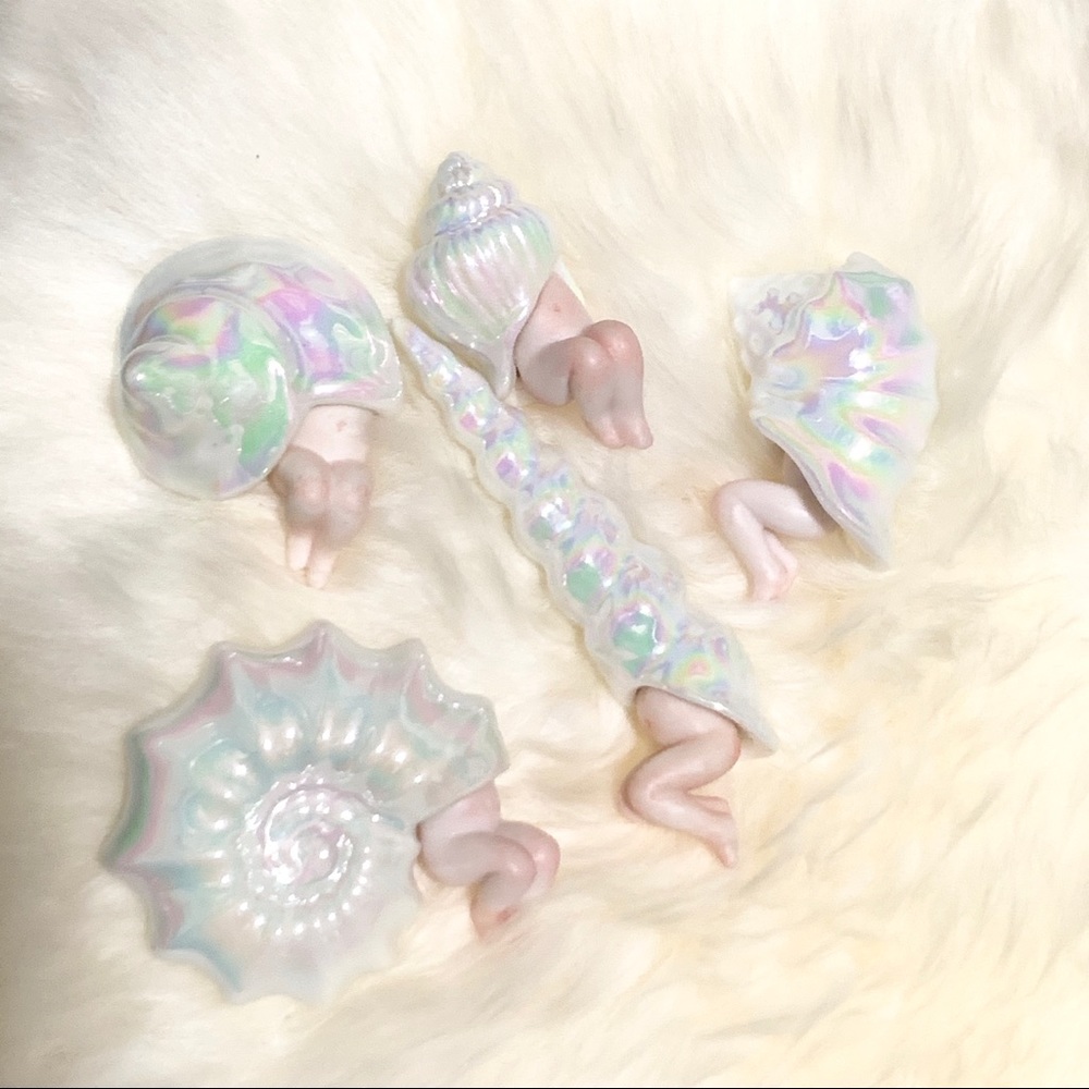 HOLOGRAPHIC introvert shell babies